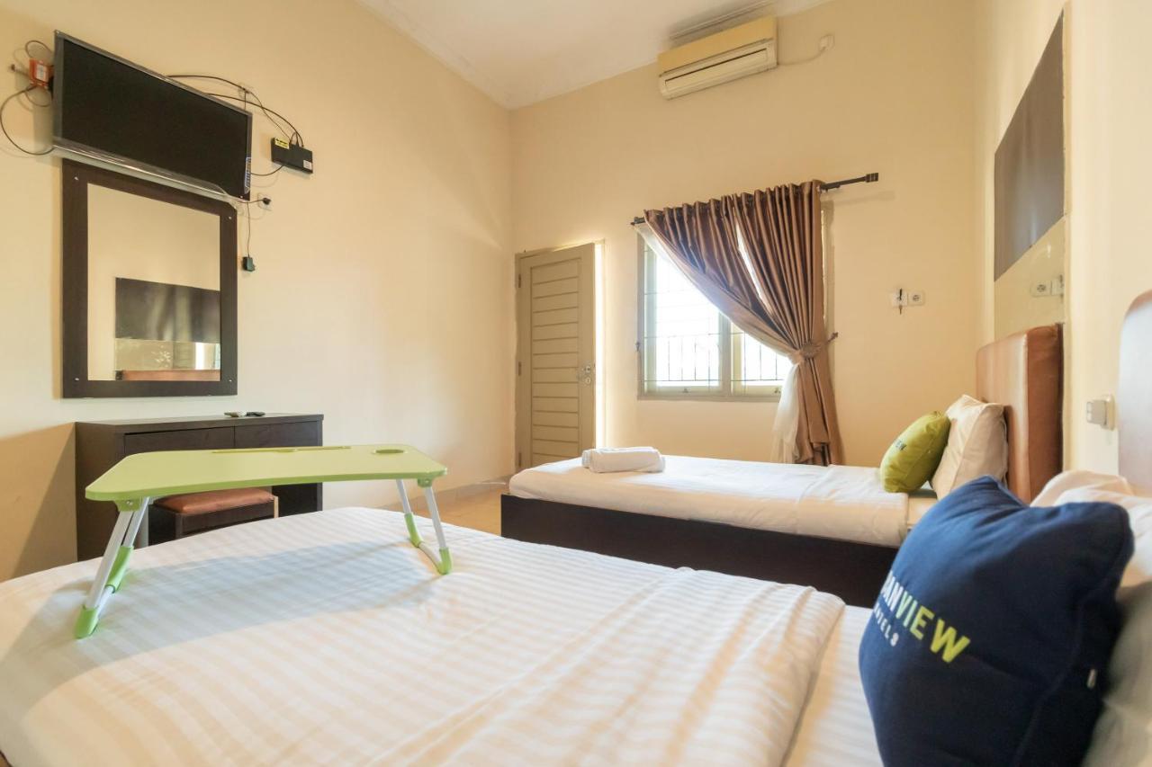 Urbanview Hotel Nugraha Palembang By Reddoorz ภายนอก รูปภาพ