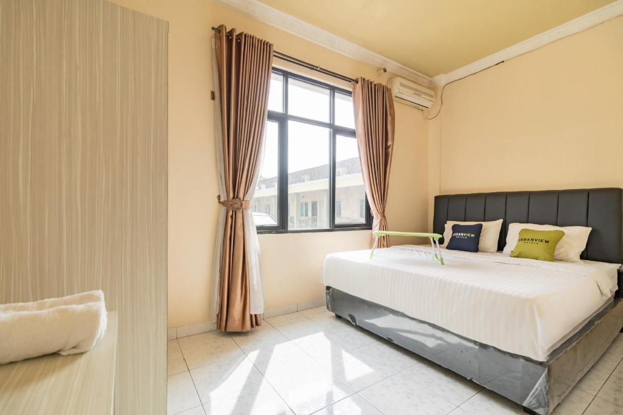 Urbanview Hotel Nugraha Palembang By Reddoorz ภายนอก รูปภาพ